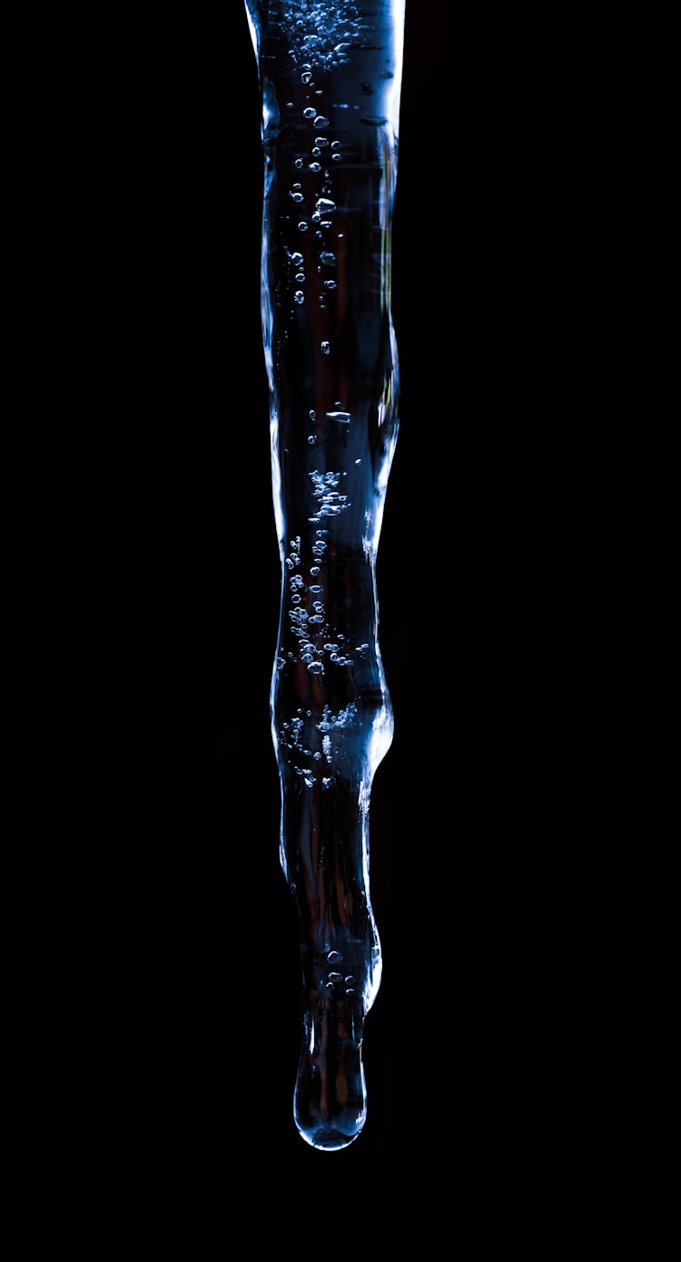 icicle against black background