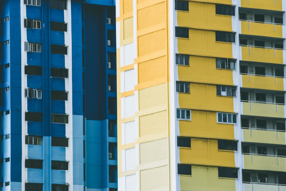 a row of multicolored buildings in a city