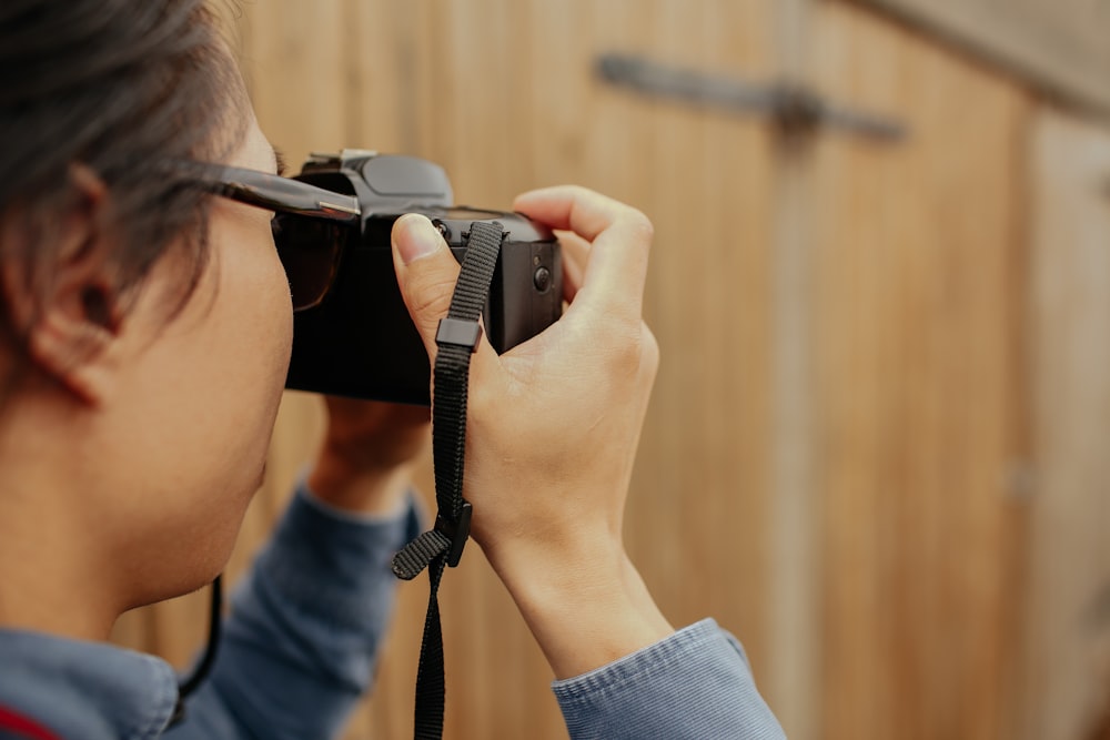 woman holding camera