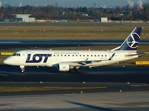 A scenic highway view during a taxi transfer between Warsaw and Poland countryside.