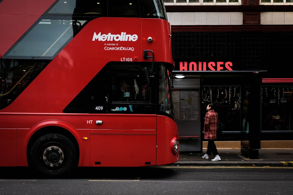 red Metroline double decker bus on road
