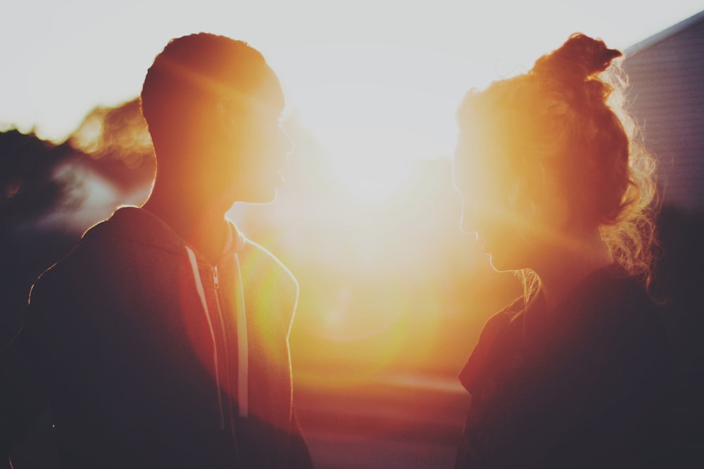 man and woman in black jacket