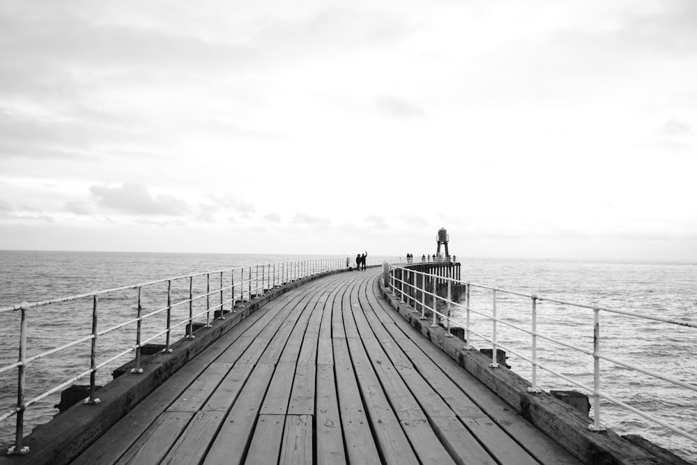 grayscale photo of dock