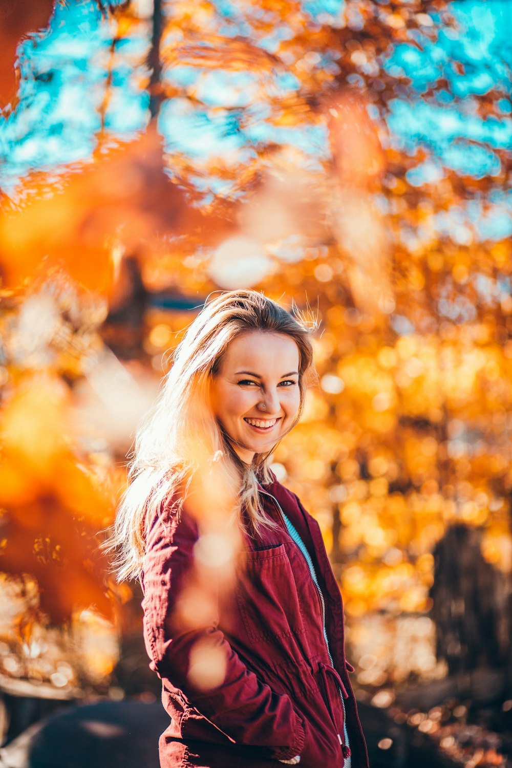 woman standing near trees