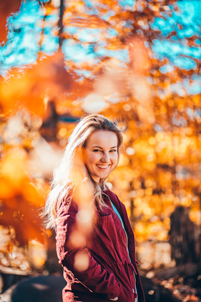 woman standing near trees
