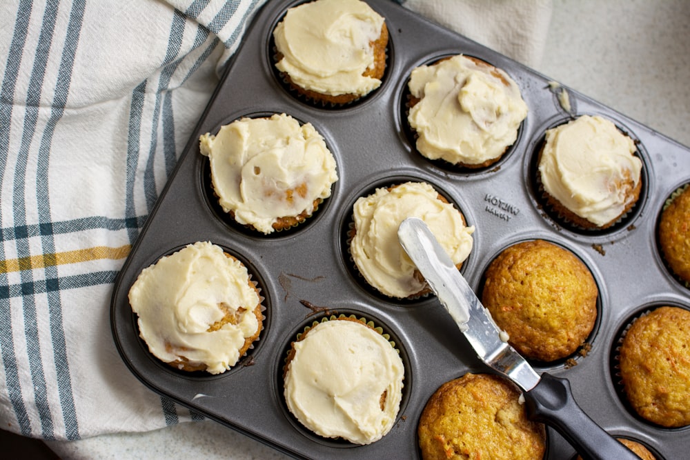 baked pastry with cream on gray molder