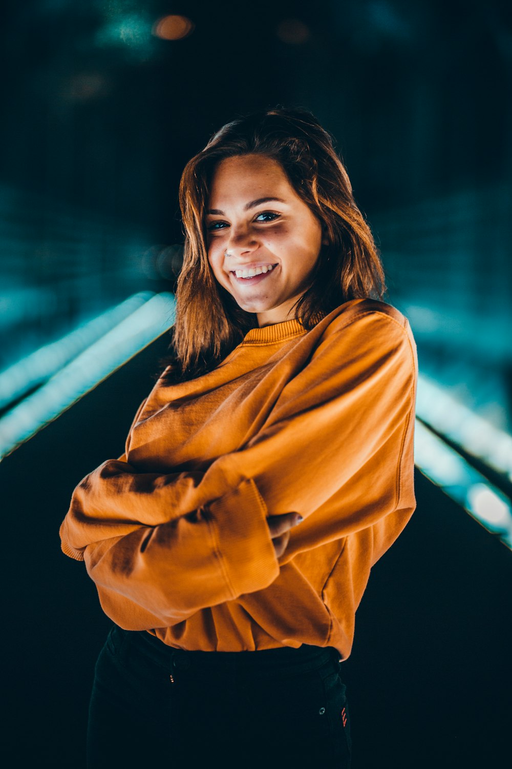 woman wearing yellow long-sleeved shirt