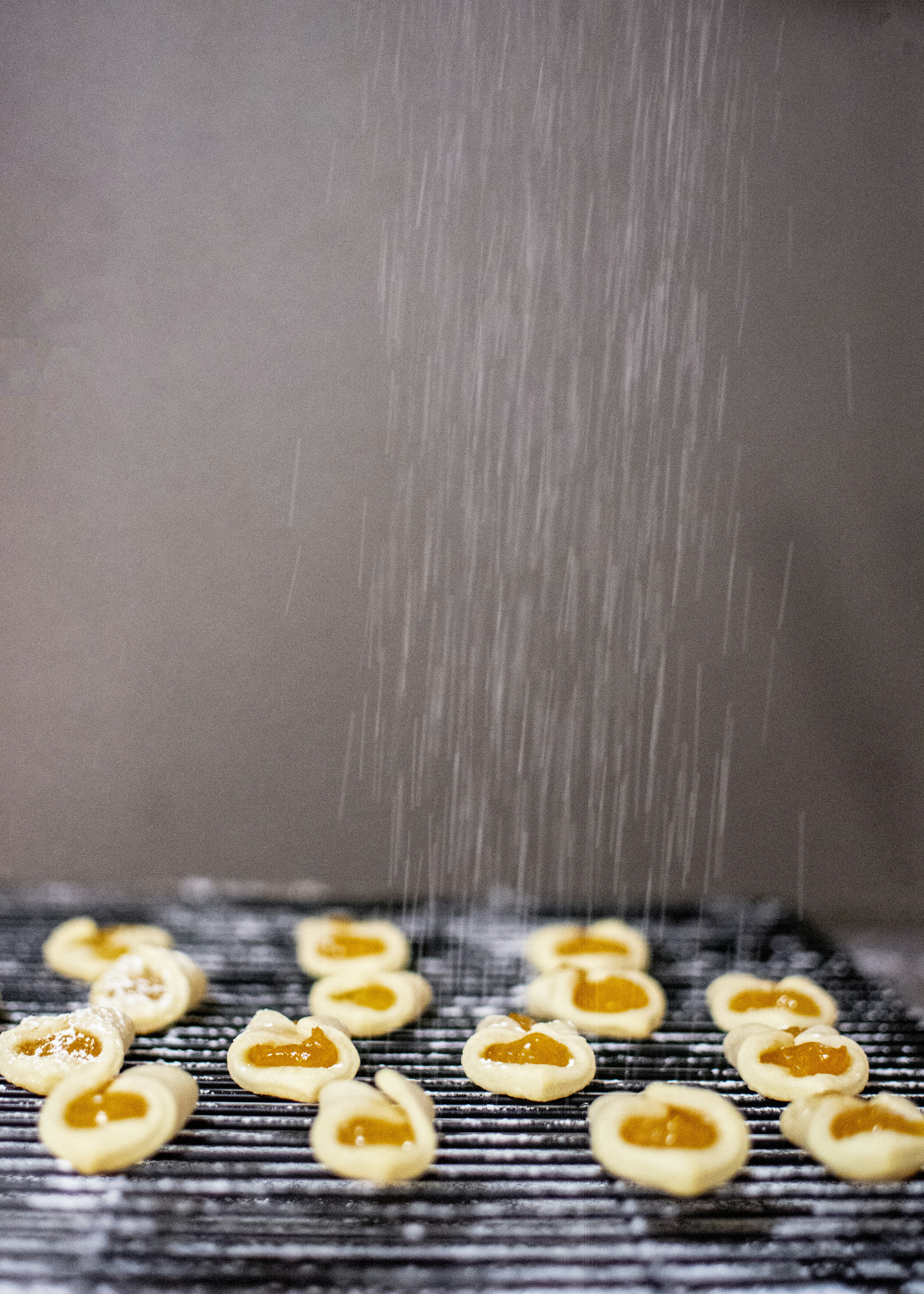 selective focus photography of food on black metal grill