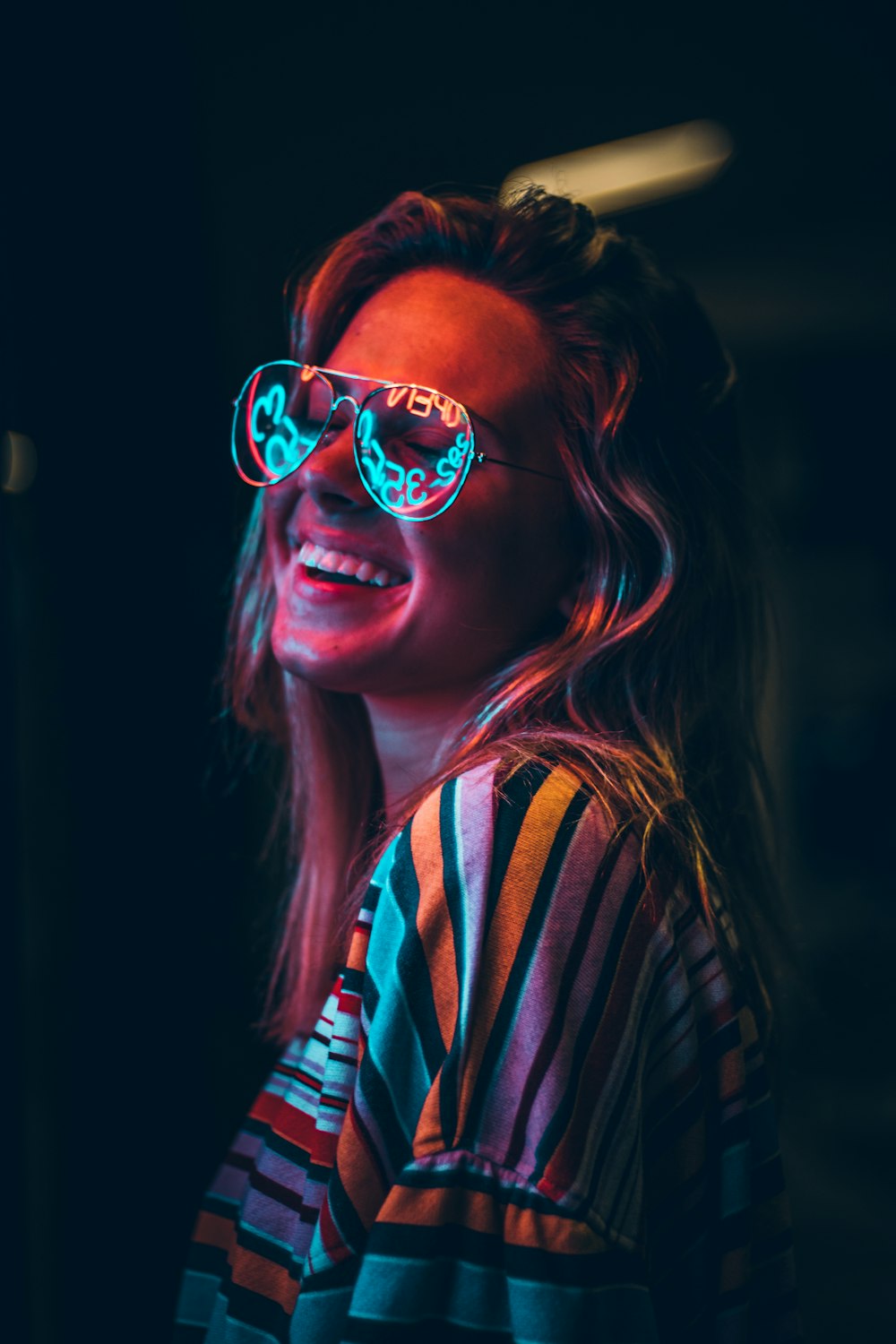 smiling woman wearing sunglasses