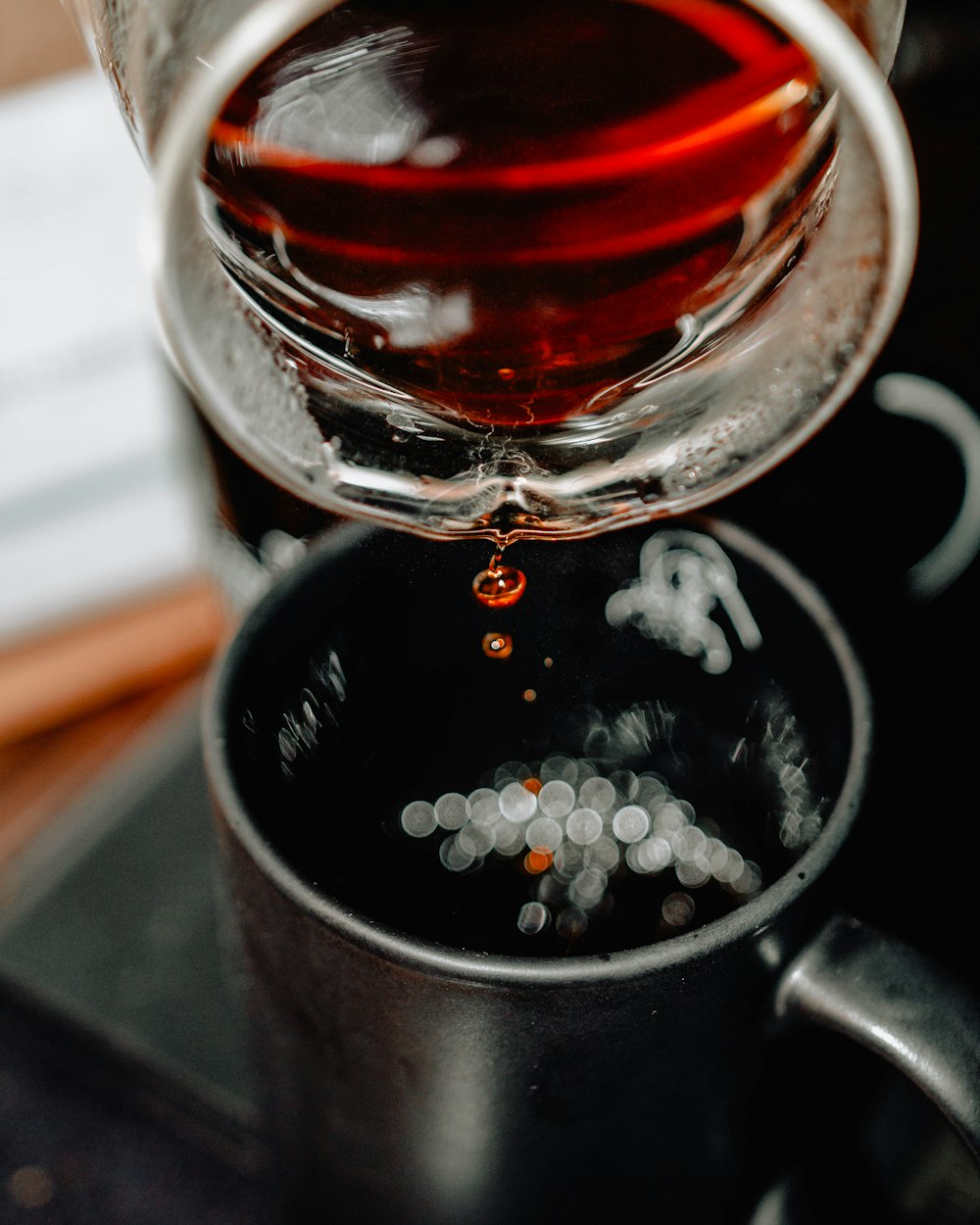 red liquid pour in silver mug