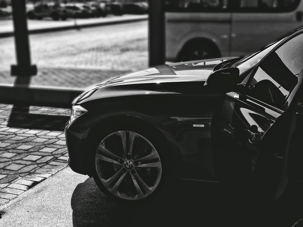 grayscale photography of vehicle hood