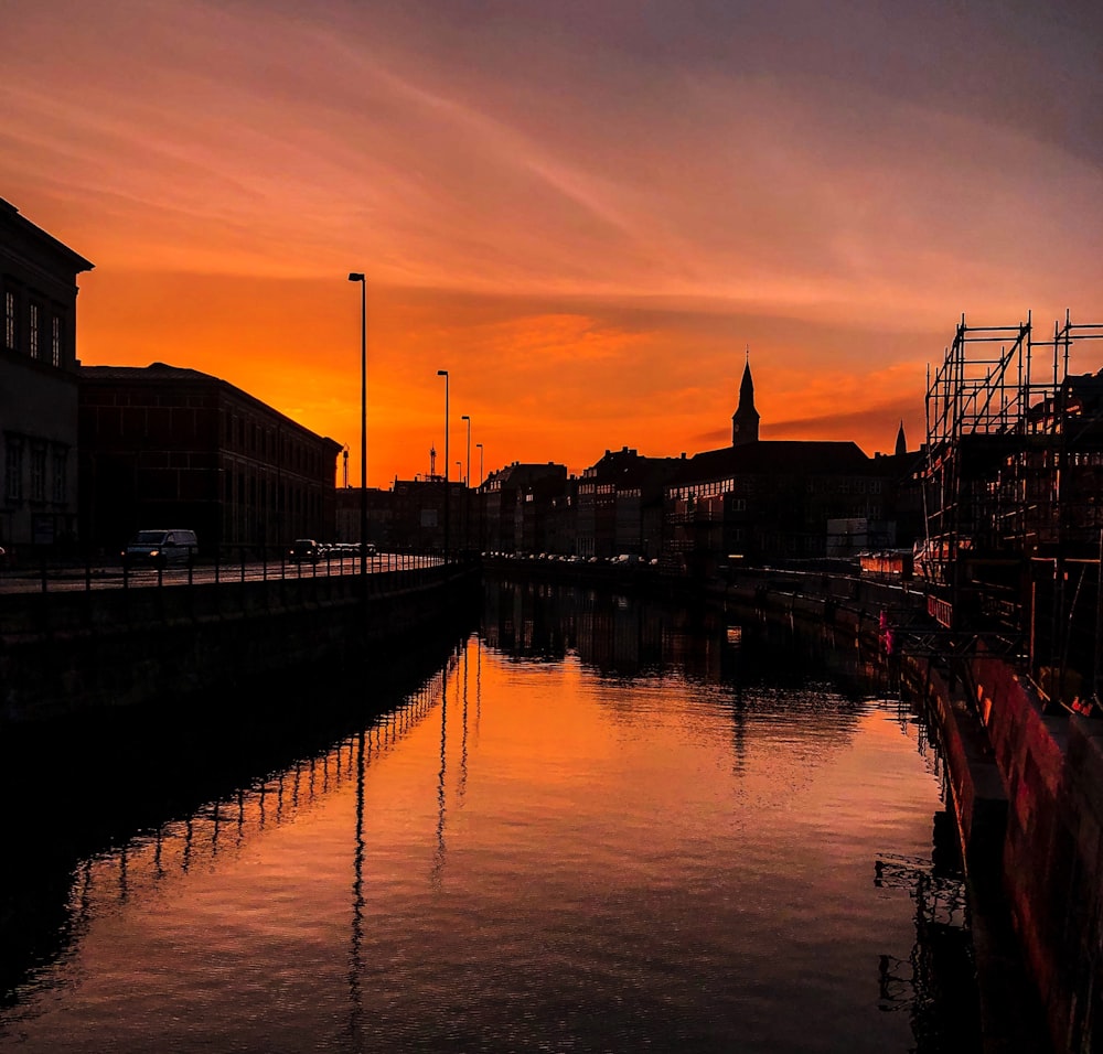 silhouette of buildings along the grand canal during golden hour