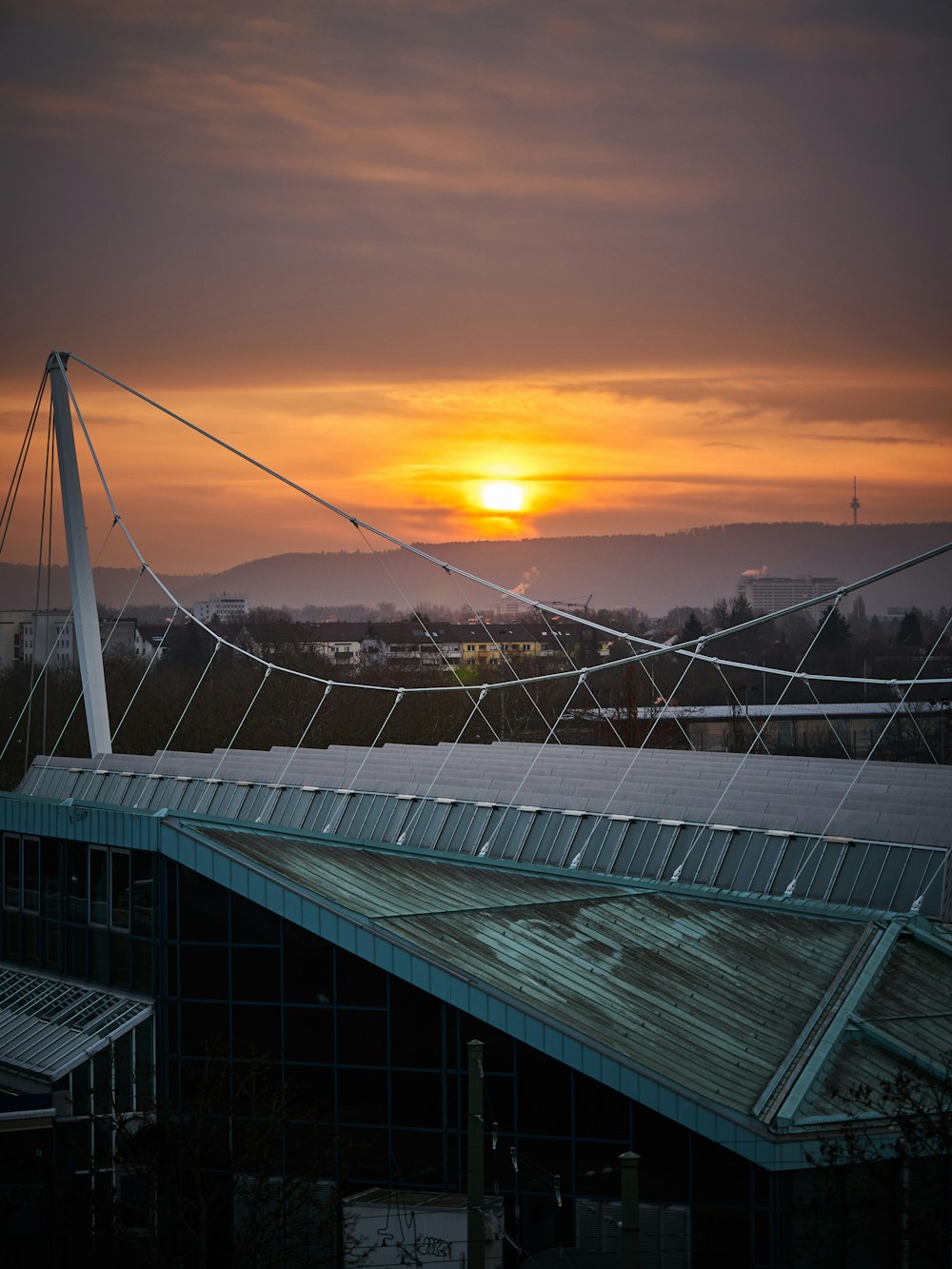 white suspension bridge during golden hour