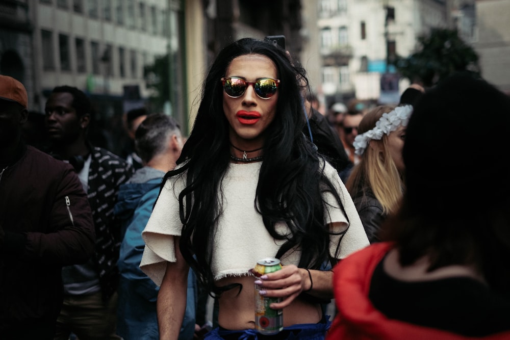 woman surrounded by people