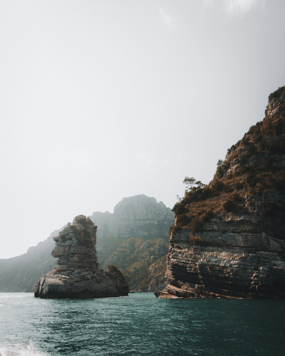 island under gray sky