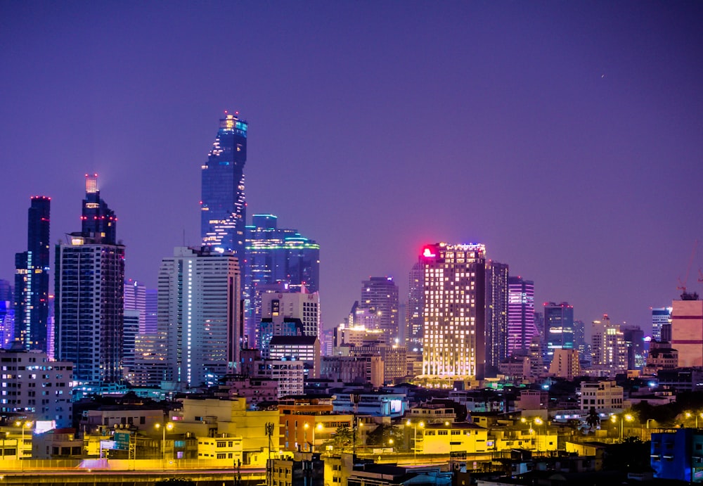 city with high-rise buildings at night time