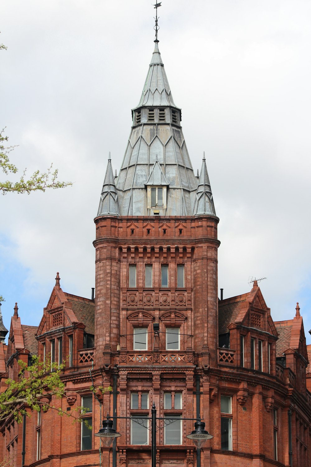 a tall building with a clock on the top of it