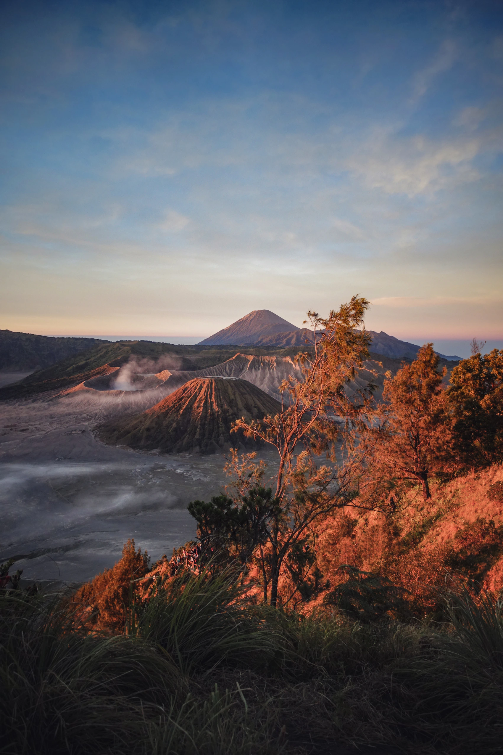 Mount Bromo rising above a misty volcanic landscape in East Java, Indonesia