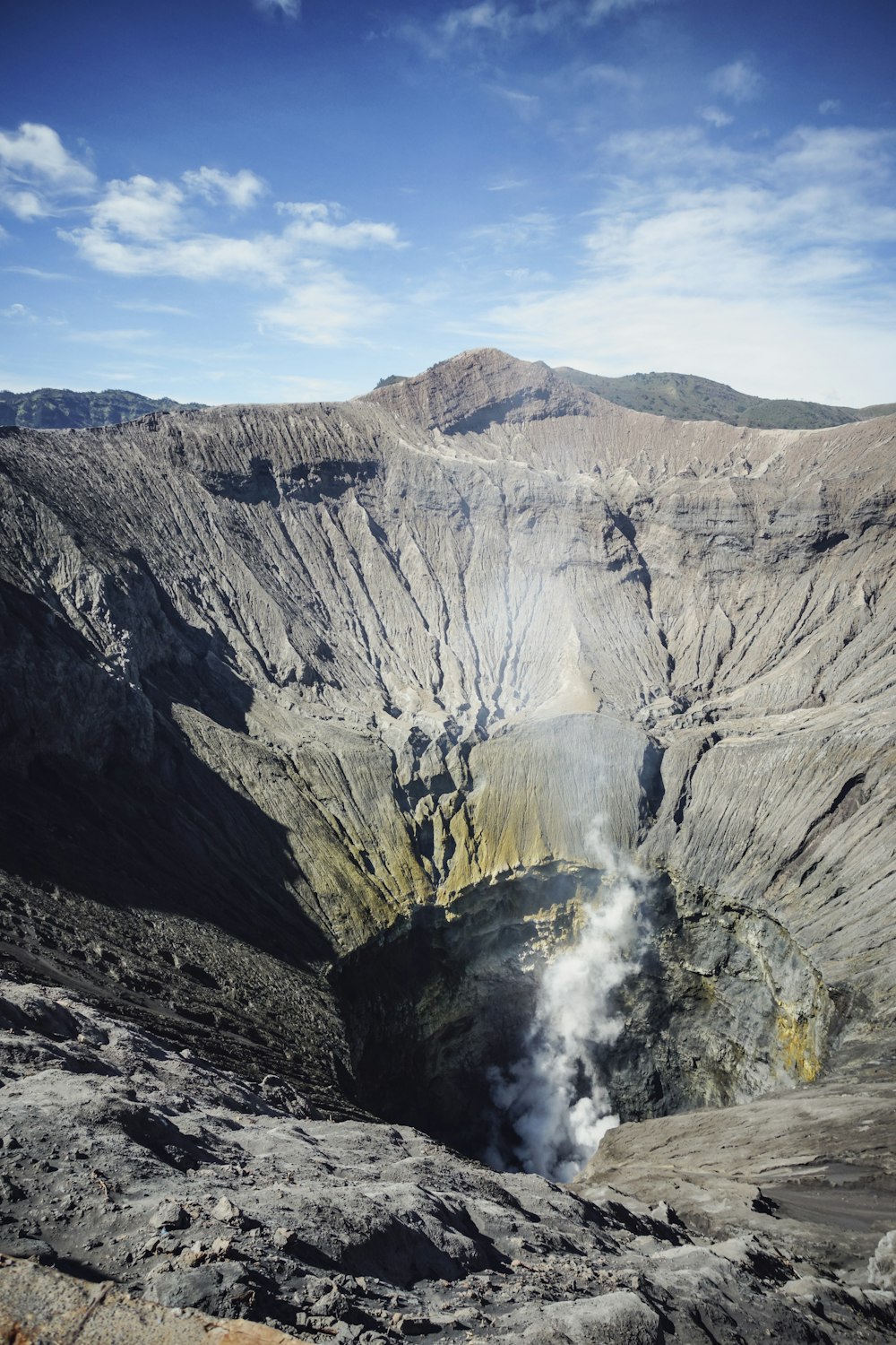 gray mountain under blue sky during daytime