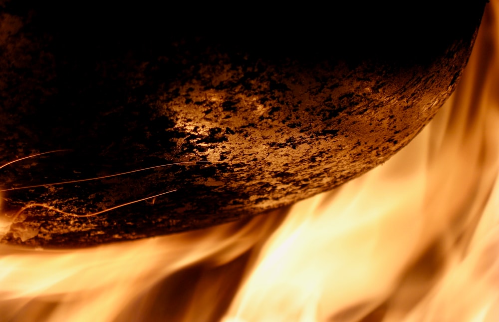 a close up of a fire with flames coming out of it