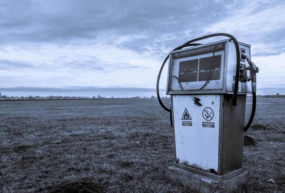 gray and black gasoline refilling station