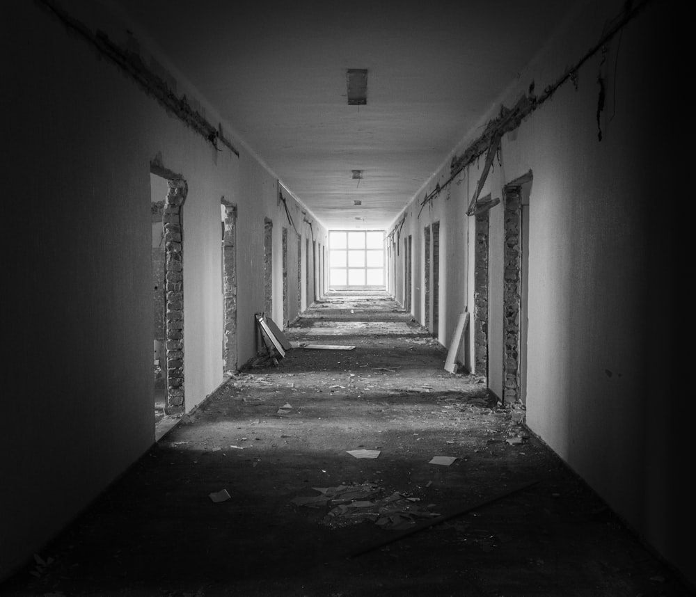 grayscale photography of abandoned building