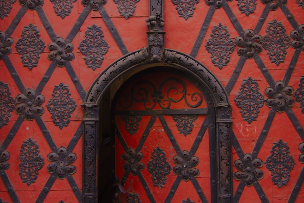 red and black wooden door