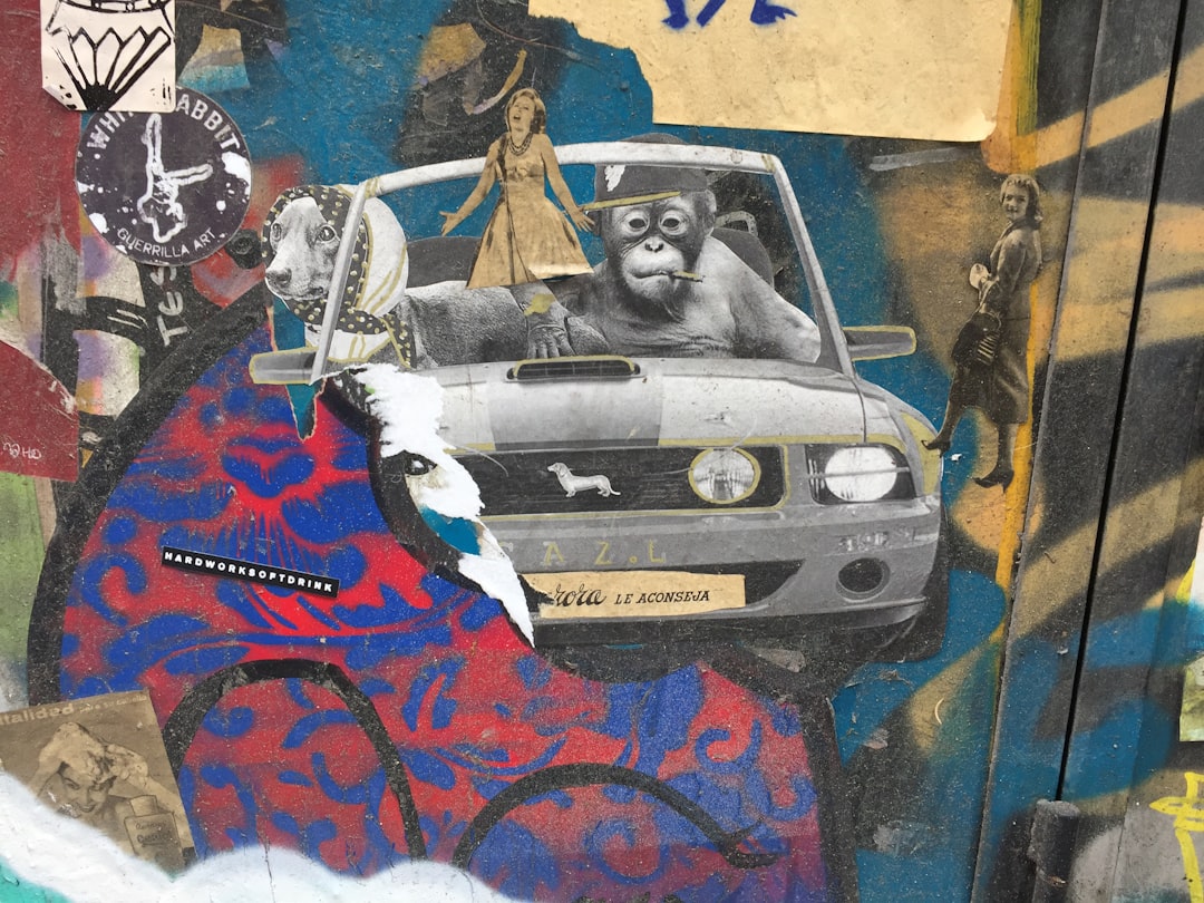 a painting on the side of a building, barcelona monkey cab