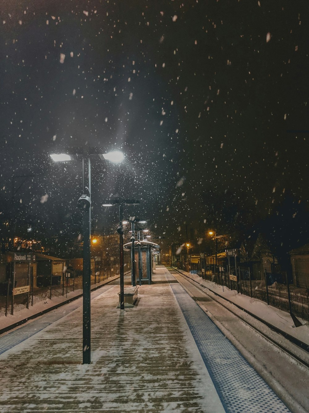 lighted street post at night