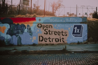A mural of Detroit neighborhoods with pins marking where community projects are underway.