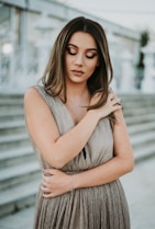 woman hugging herself