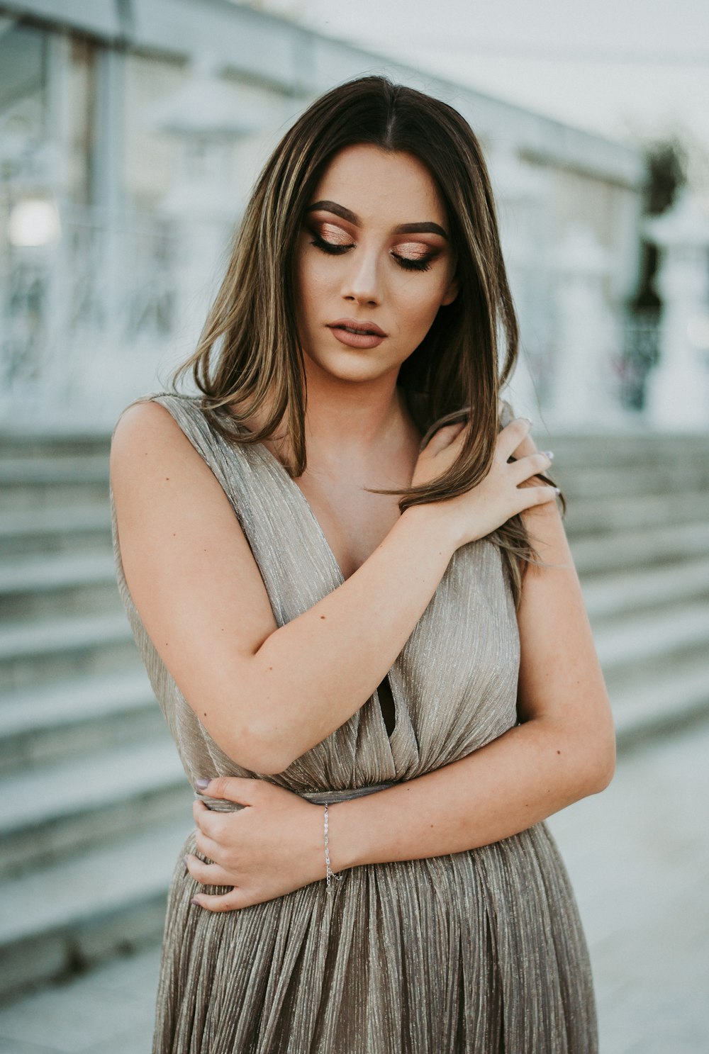 woman hugging herself