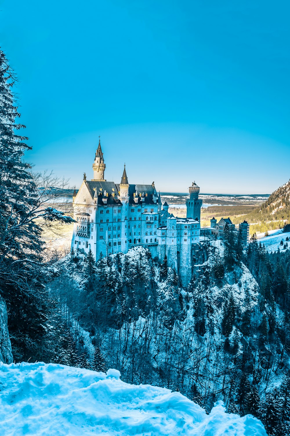 castle on top of rocky mountain