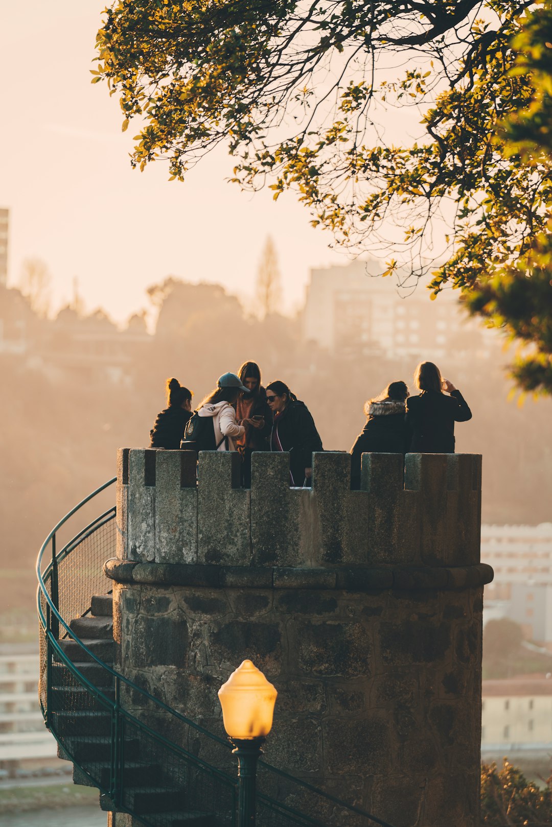 people on top of tower