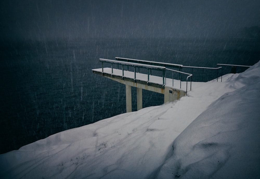 concrete dock covered in snow