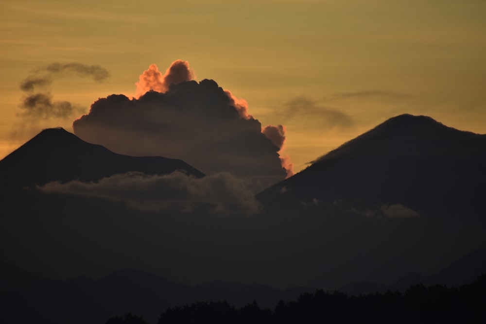 mountains under white sky