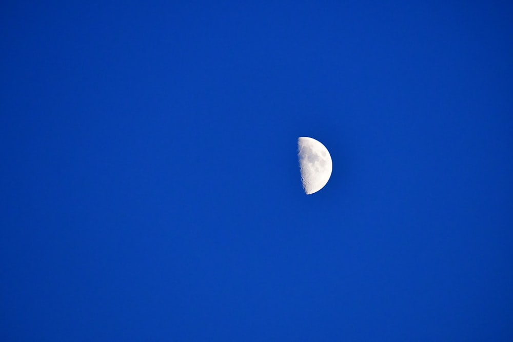 half moon on blue sky