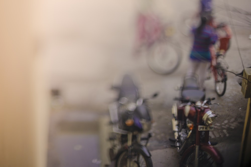 two parked motorcycles next to each other