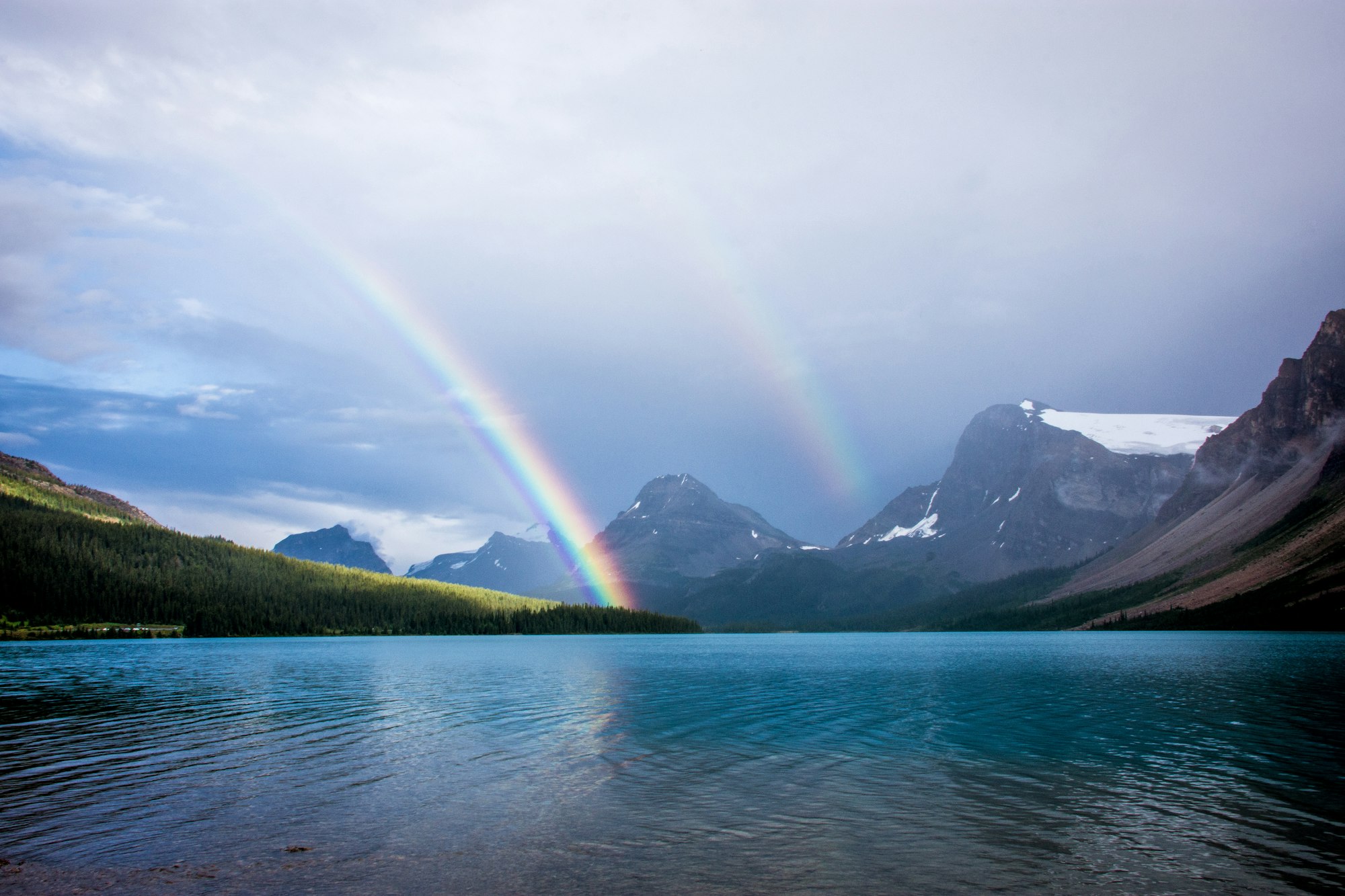 A double rainbow forms over Bow Lake in Banff National Park, Alberta, Canada