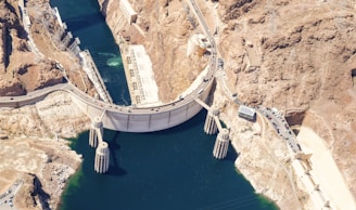 white concrete dam during daytime