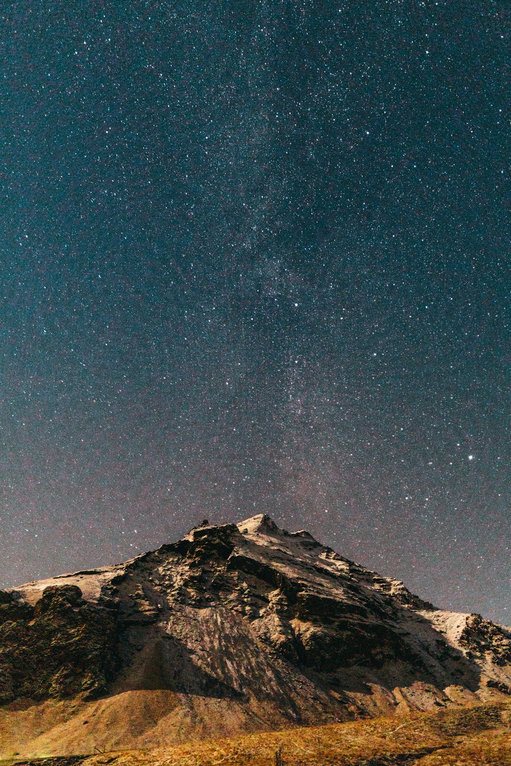mountain under starry night