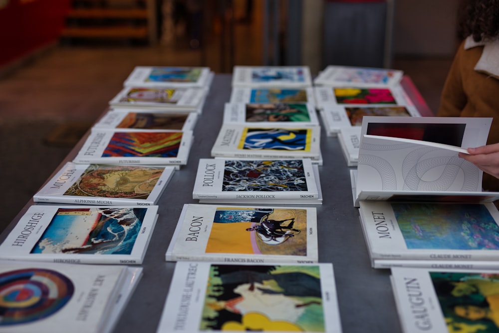 assorted-title books on gray table