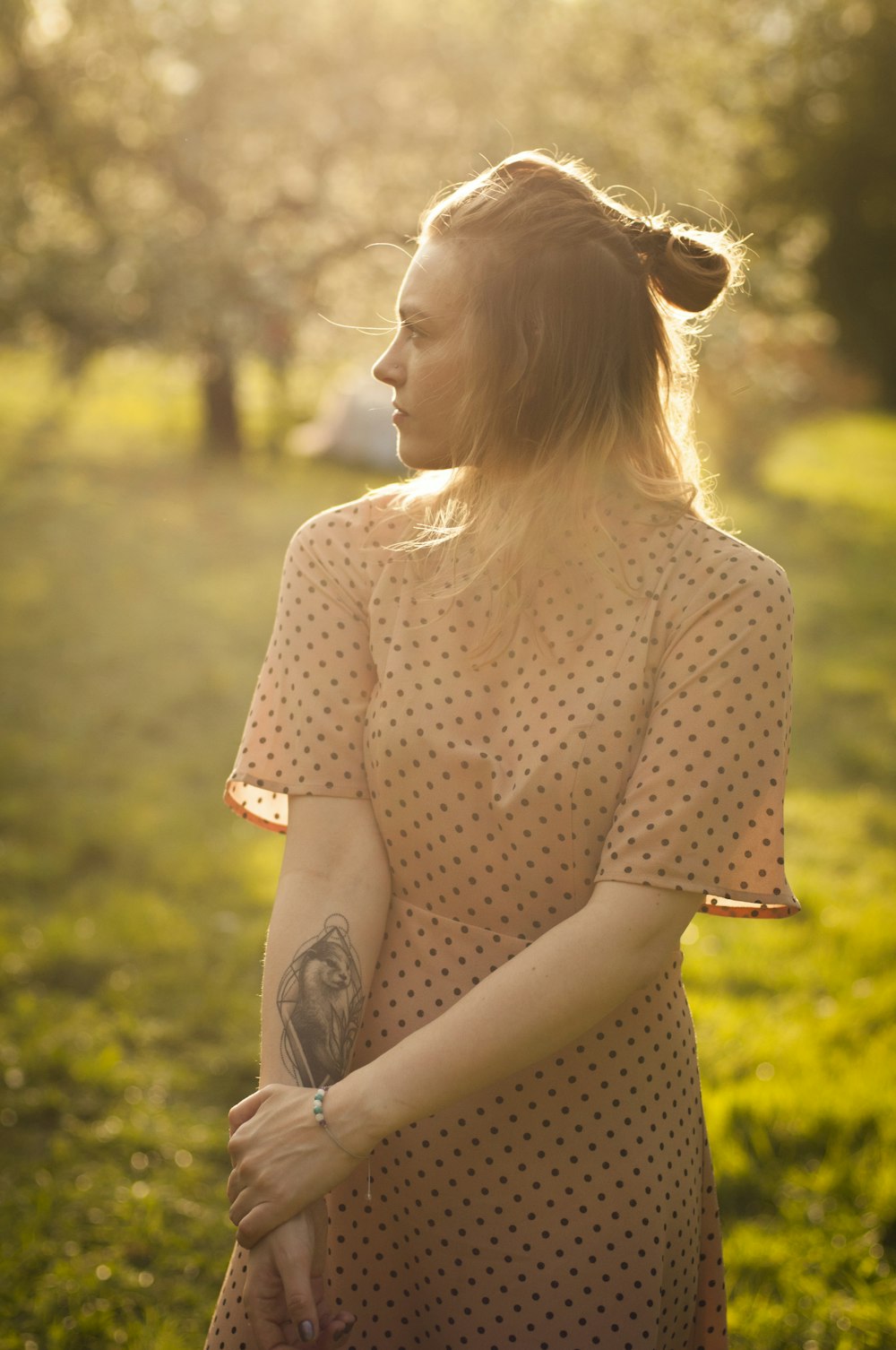 women's brown and black polka-dot short-sleeved dress