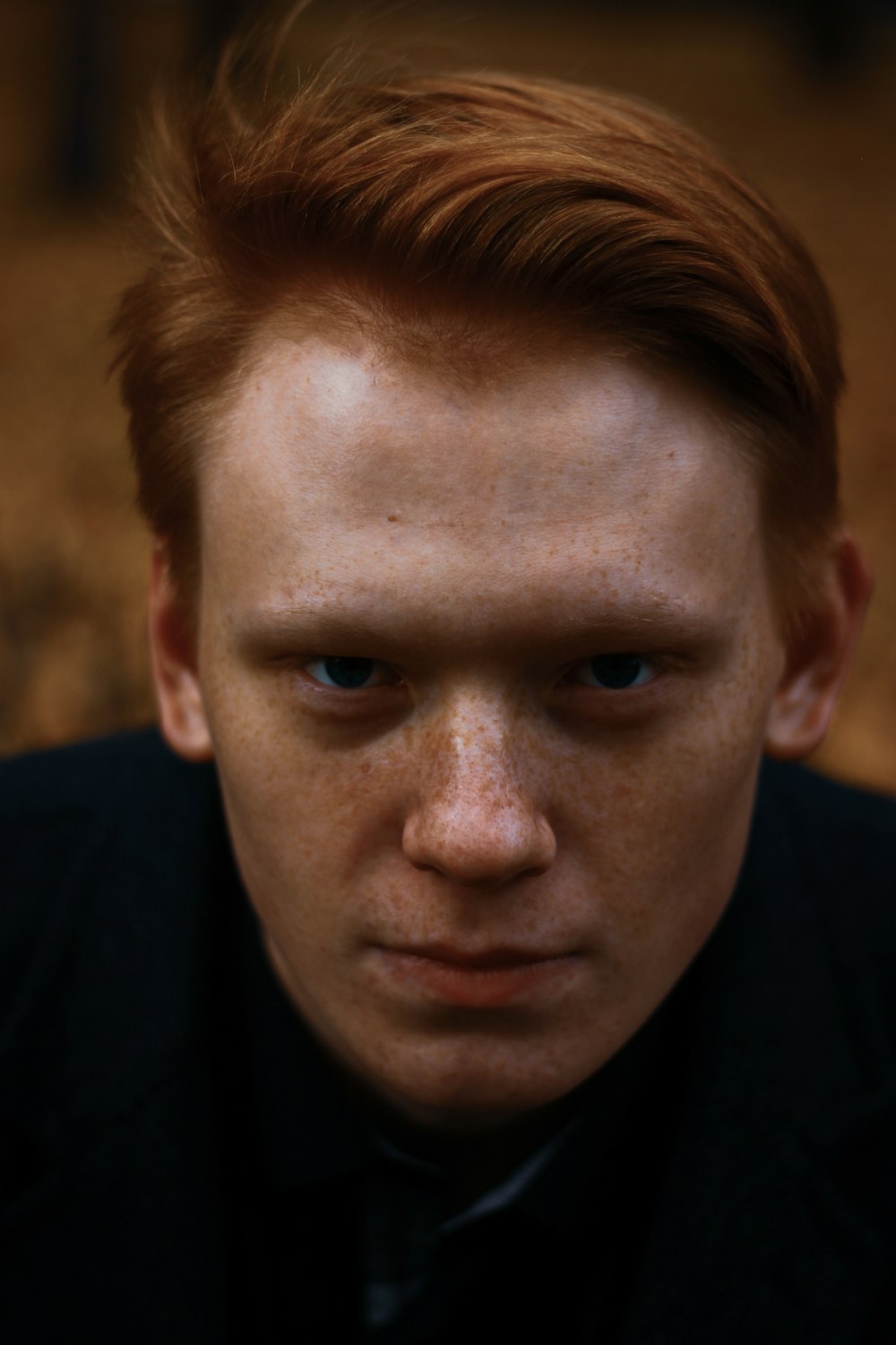 man wearing black top close-up photo