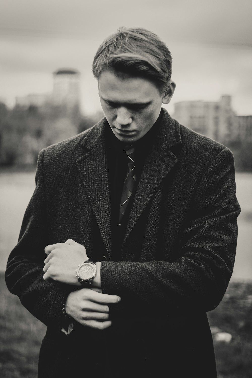 man wearing blazer and watch