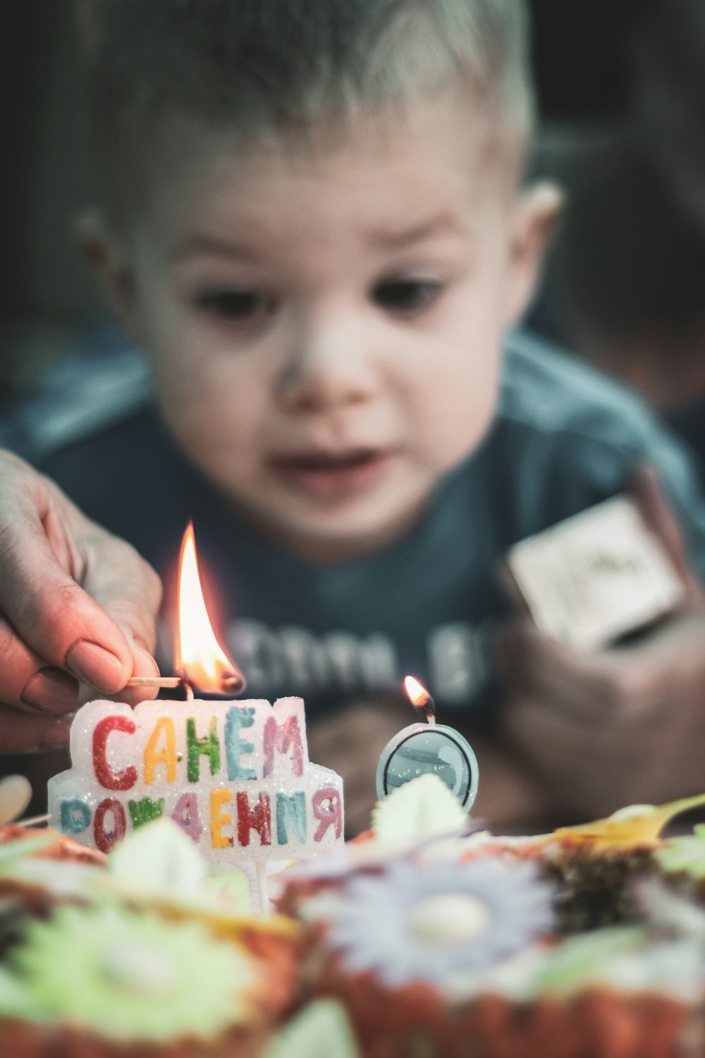 boy about to blow birthday candle