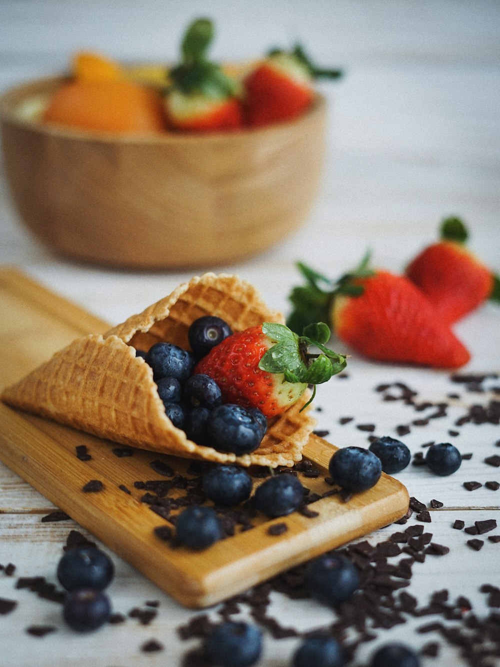 blueberry and strawberry in cone