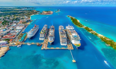 aerial photography of white and blue cruise ships during daytime