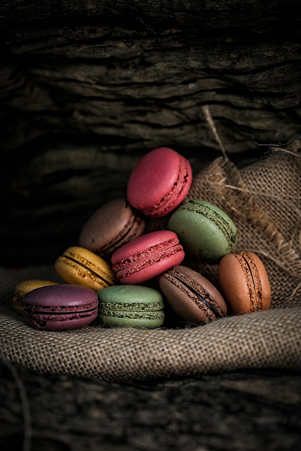 French macaroons on gray textile