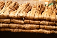 Stacks of dried herbal raw materials neatly packed for export.